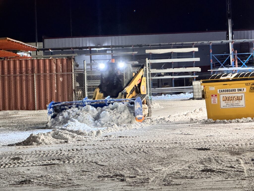 Snow Removal with a Skid Steer and Large Blade