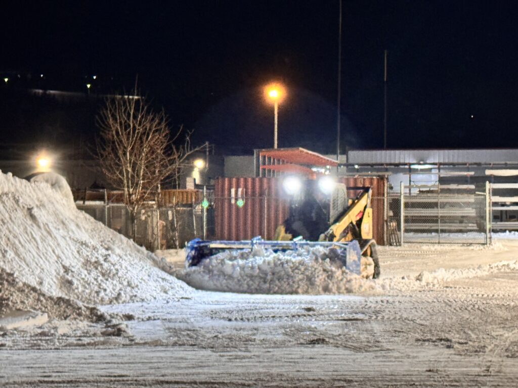 Snow Removal with a Skid Steer and Large Blade