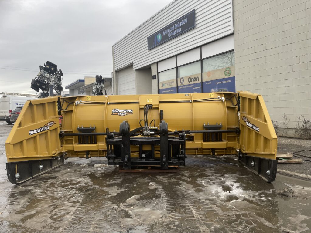Our Monster blade for snow plowing. 12-22' wide